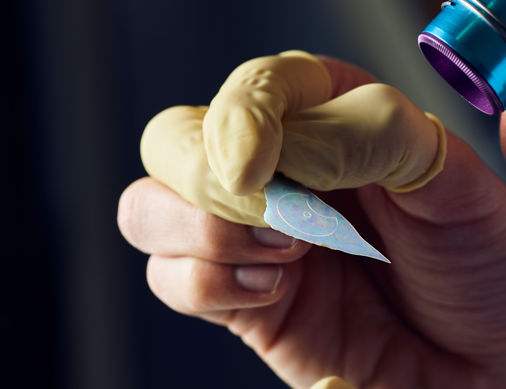 Checking_the_outline_of_the_hour-minute_subdial_of_the_Romain_Gauthier_Insight_Micro-Rotor_Lady_Opal_cut_on_an_opal_slice