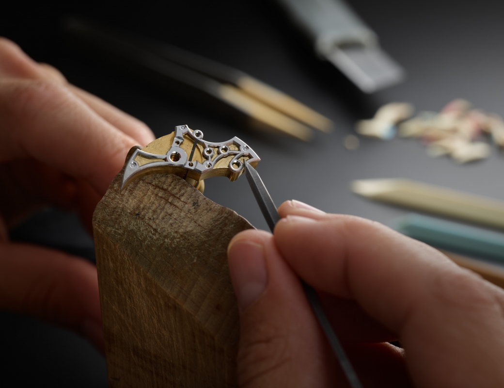 Bevelling a bridge from the Romain Gauthier Insight Micro-Rotor Squelette using a steel file